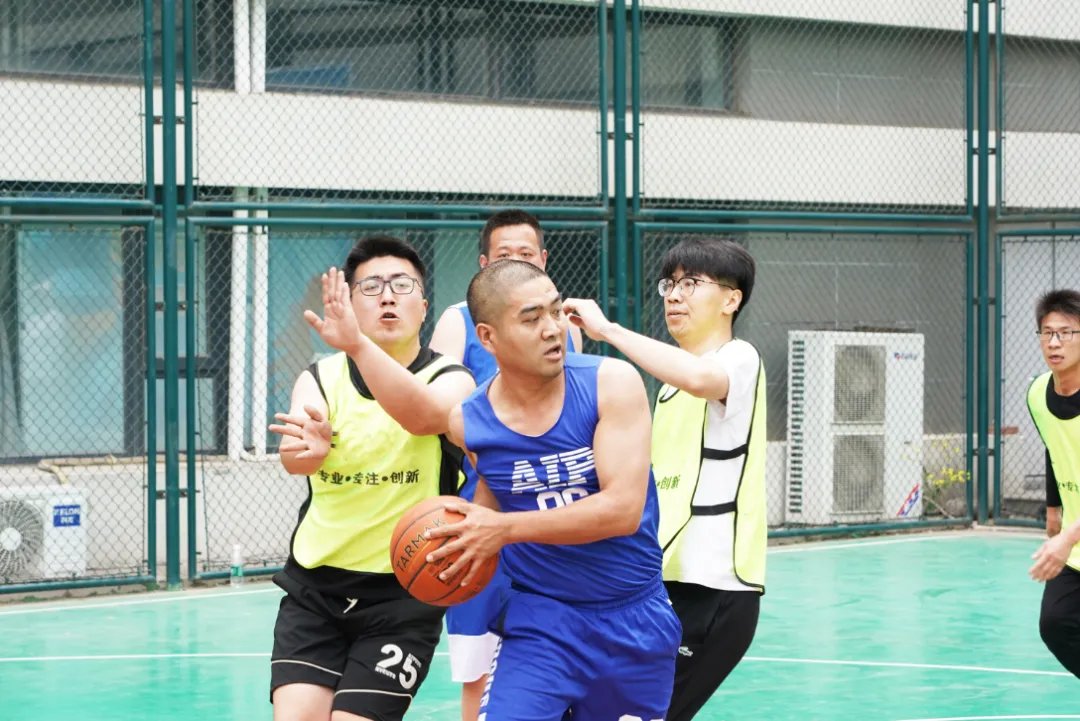 AIP employees participated in a friendly basketball game in the park and won!