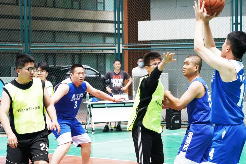 AIP employees participated in a friendly basketball game in the park and won!