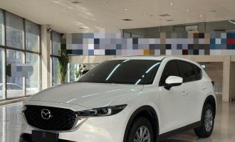 Mazda CX-5, 2022 model year, 2.0L, automatic transmission, front-wheel drive, “Smart Style” trim