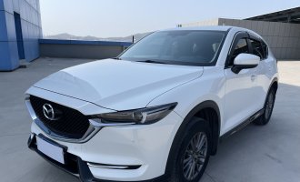 2021 Mazda CX-5, 2.0L, automatic transmission, front-wheel drive, “Smart” trim