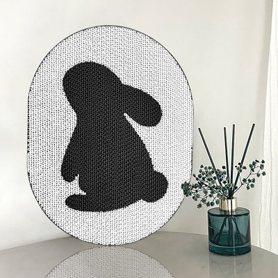 Black Rabbit Scratching Pad On White Background