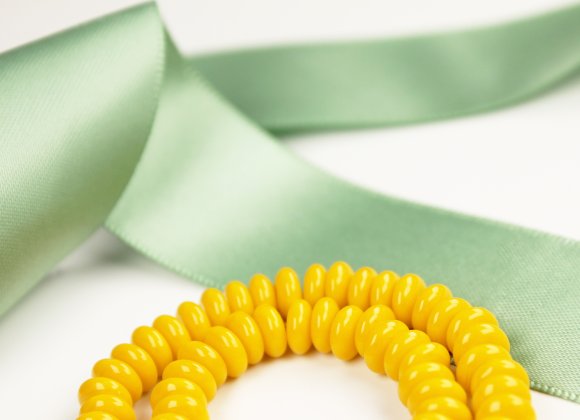 Yellow Strand of Czech Bohemian Glass Red Rondelle Shaped Trade Beads