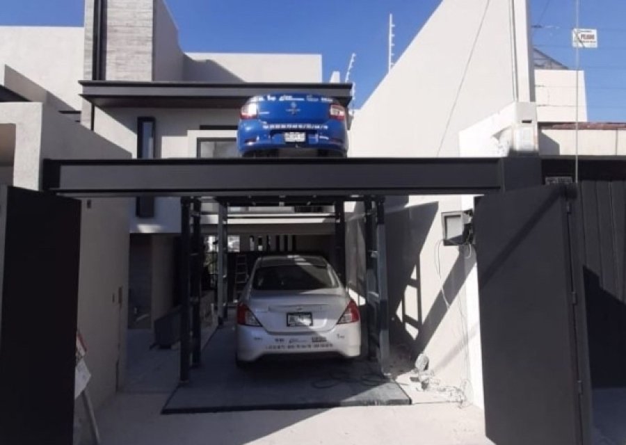 INVISIBLE PARKING SPACE FOR PRIVATE GARAGE WITH MUTRADE SCISSOR LIFTING PLATFORMS